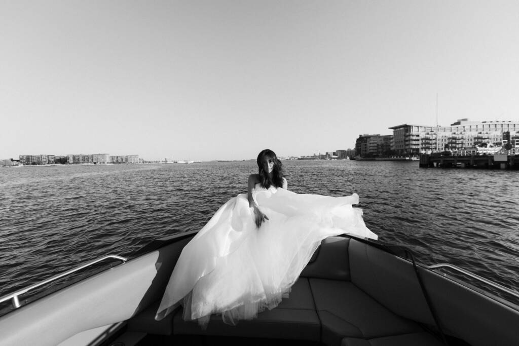bride on a luxury boat wedding wearing amsale dress